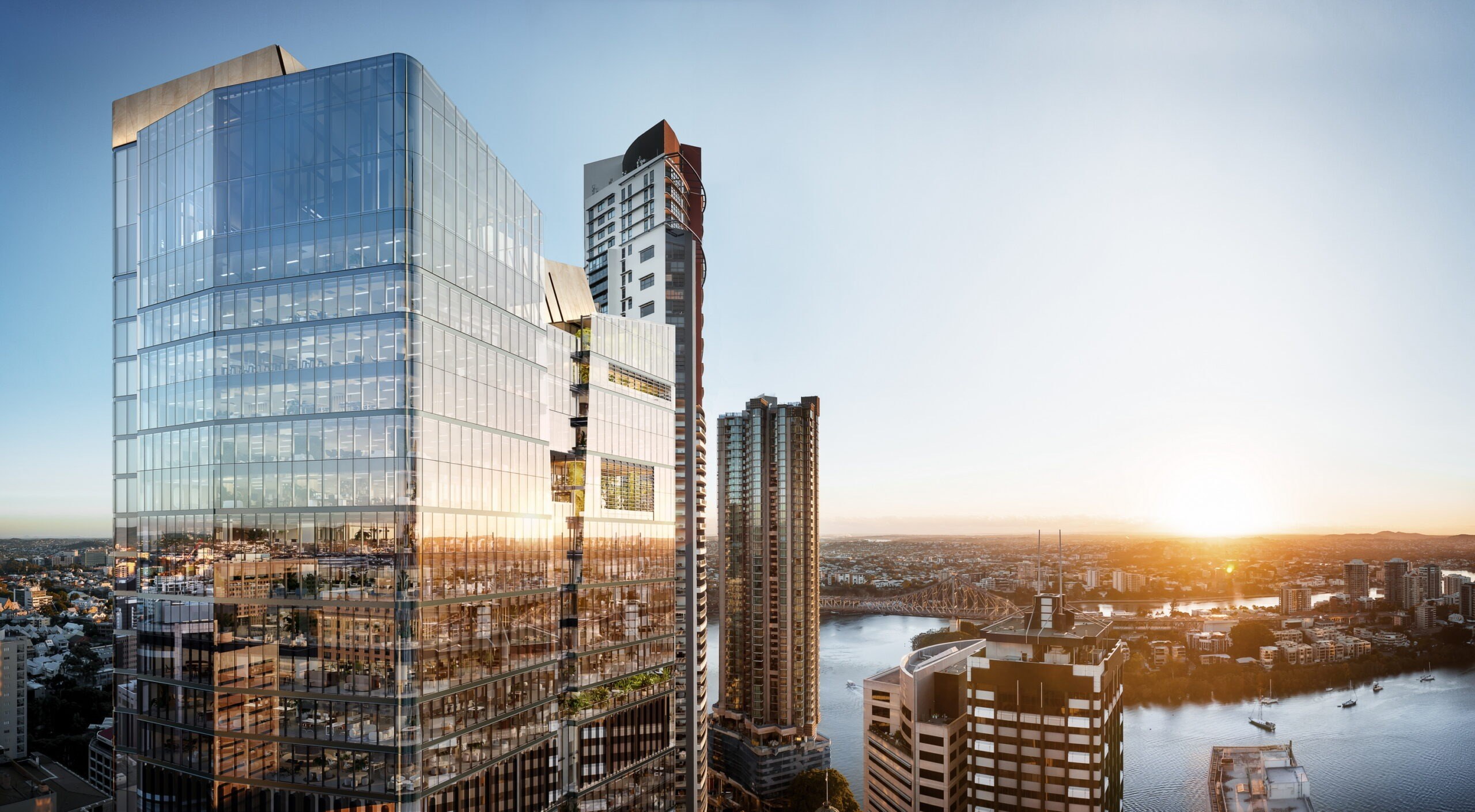 Modern glass high-rise towers with sunset views overlooking a river and cityscape in an urban waterfront district.