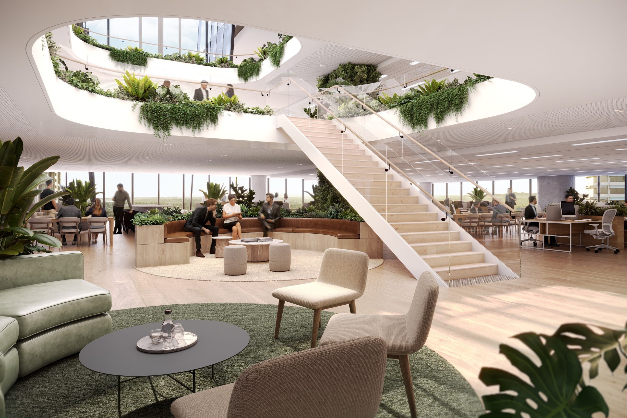 Modern office atrium with skylights, indoor plants, wooden staircase, and lounge seating areas with people working and conversing.